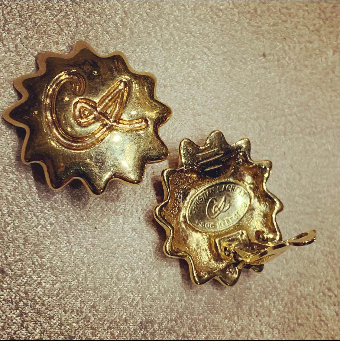 Christian Lacroix gold Starburst clip on earrings