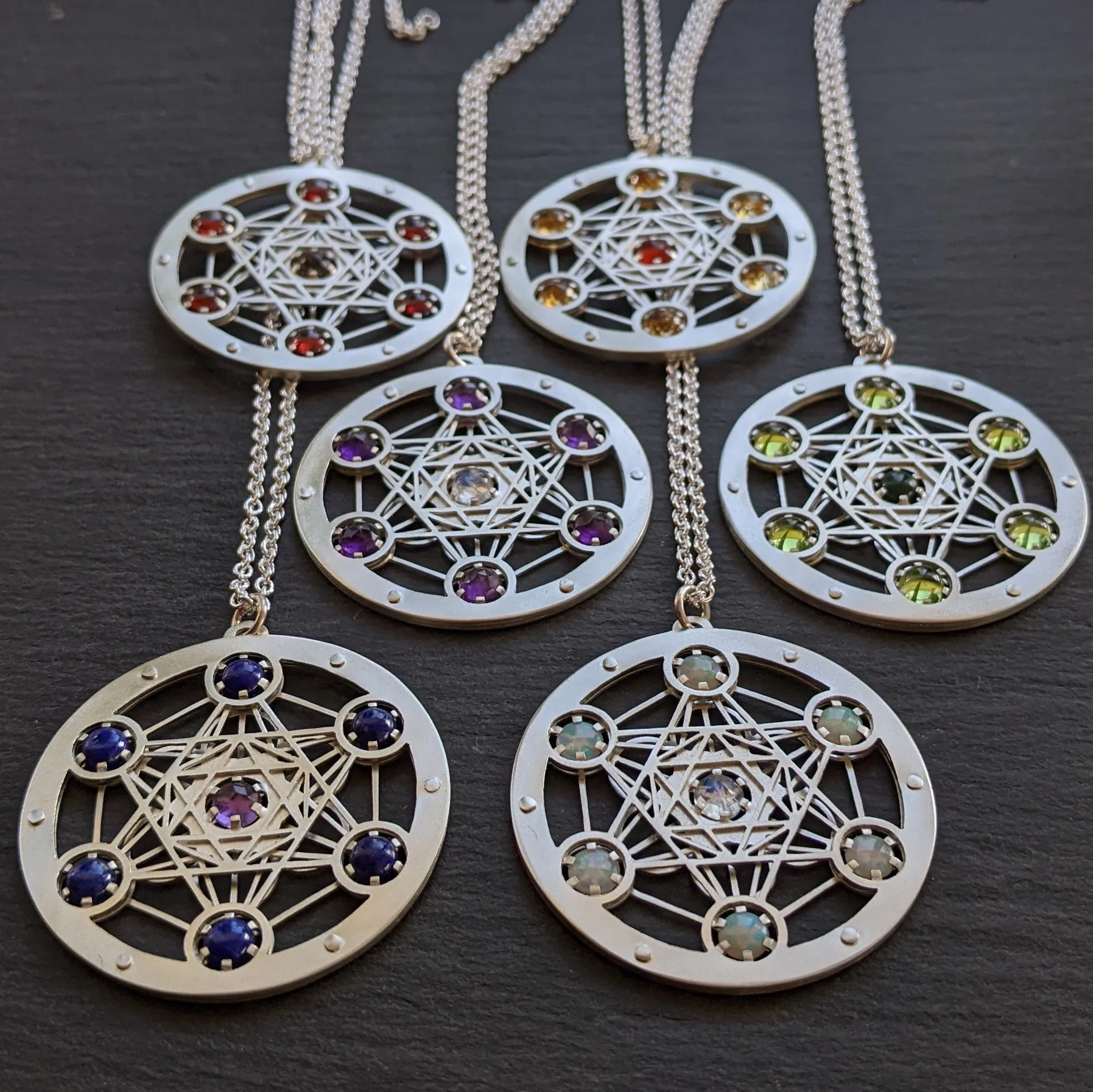 Handcut Metatron's Cube Seven Gem Pendants