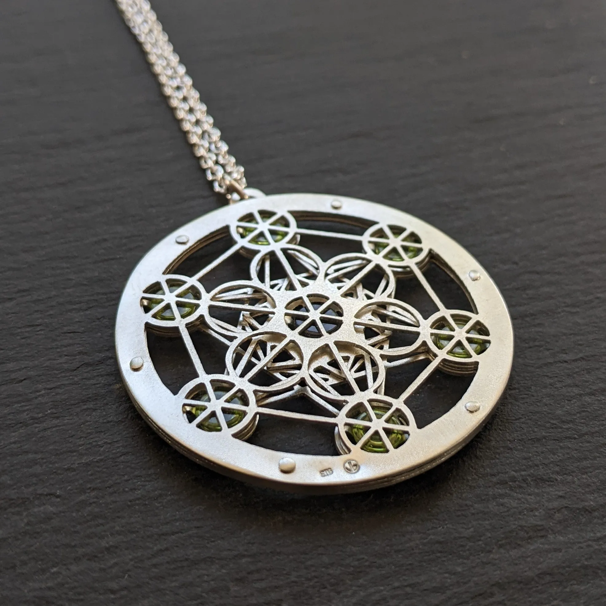 Handcut Metatron's Cube Seven Gem Pendants