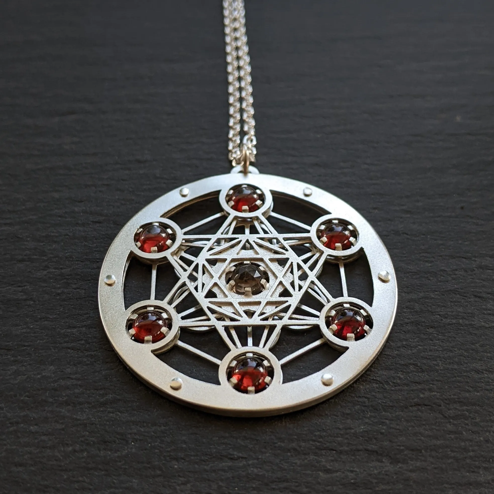 Handcut Metatron's Cube Seven Gem Pendants