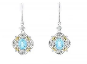 Italian sterling silver earrings with a blue topaz center stone, 0.24ct. diamonds and solid 14K yellow gold accents.