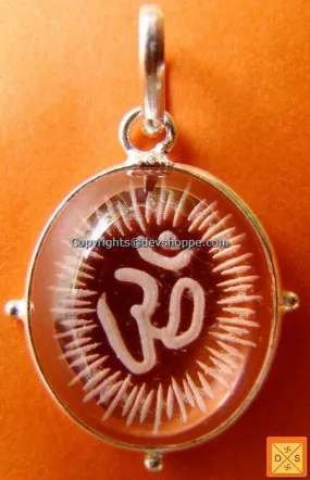 Om' hand carved crystal pendant in white metal